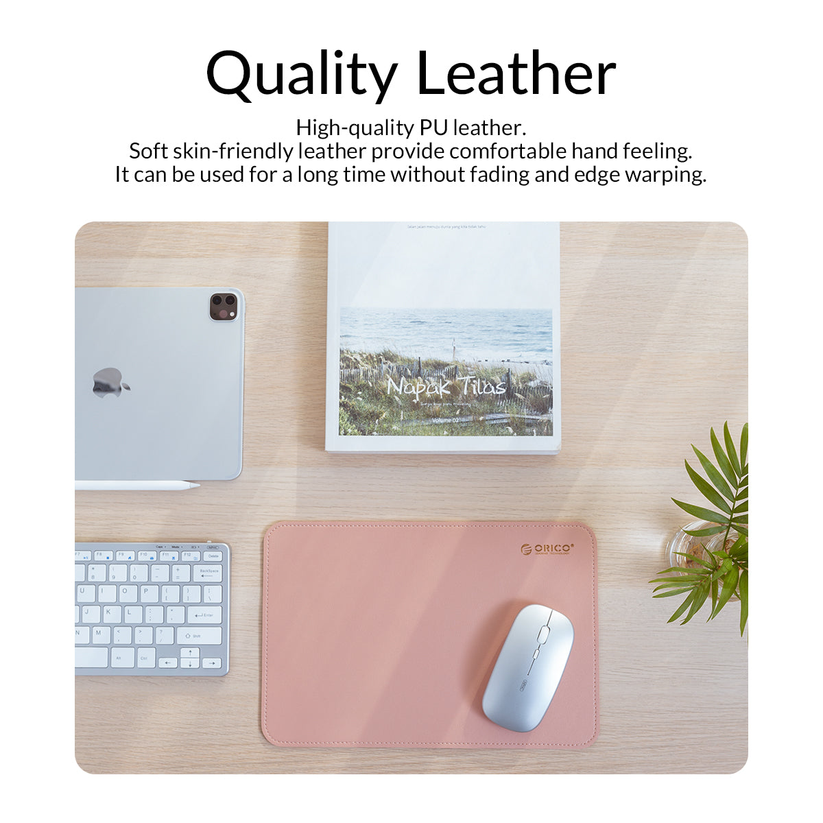 Top-down overhead shot of pink ORICO PU leather mouse pad on light wood desk, matched with silver tablet, wireless keyboard, landscape magazine and small green plant; title "Quality Leather", text introducing premium skin-friendly PU leather, fade-resistant and anti-warp edge