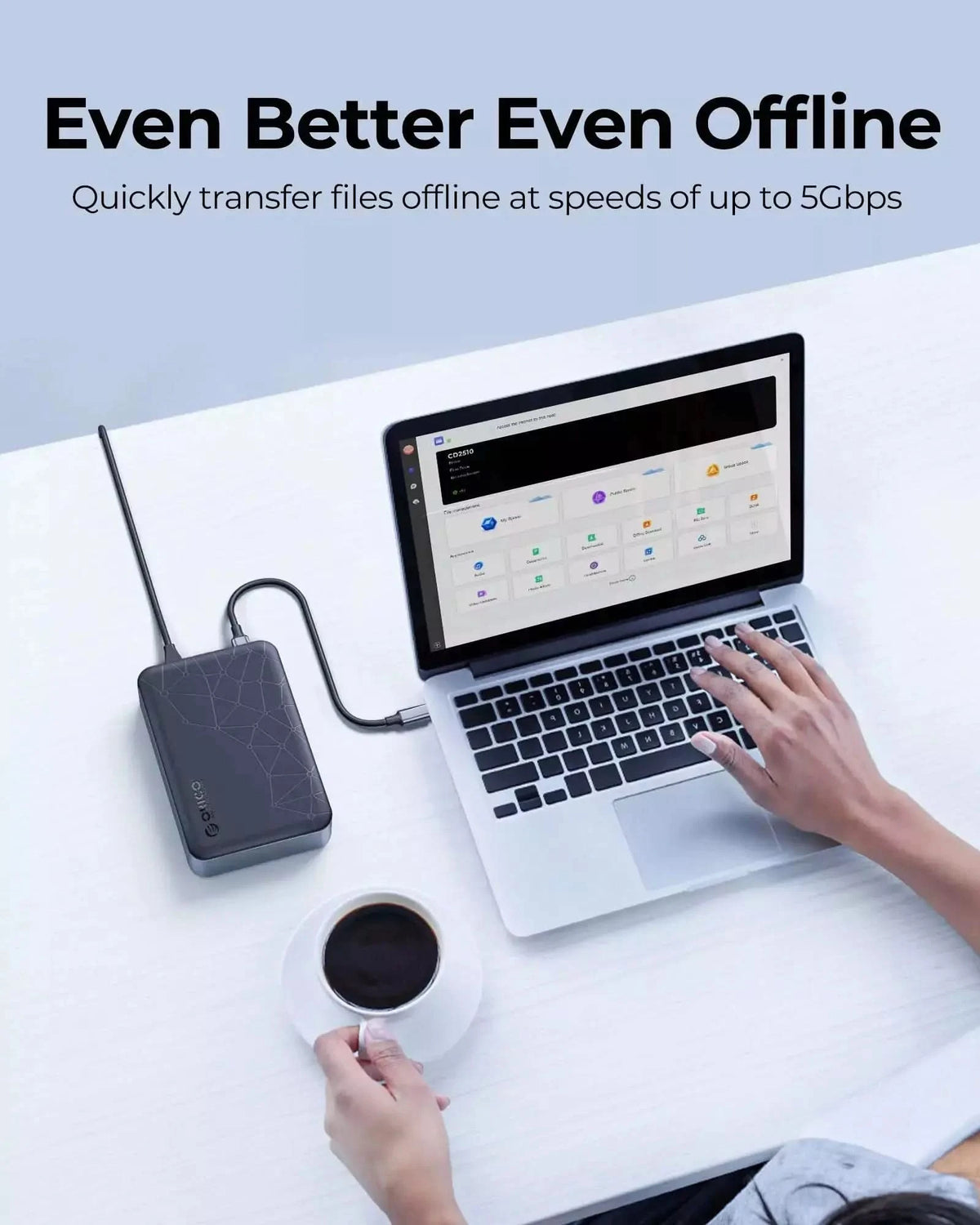 Personal cloud storage connected to laptop for fast offline file transfer up to 5Gbps.