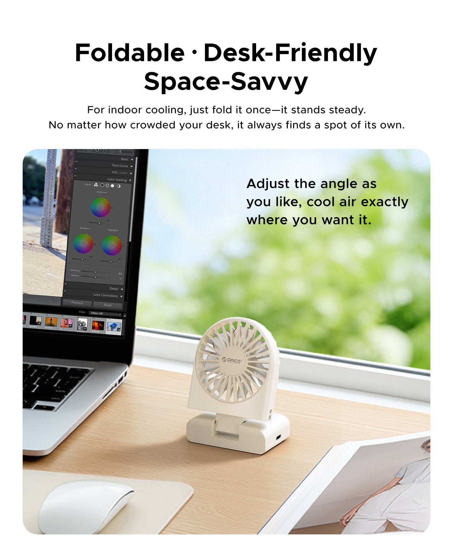 Folded ORICO ReFan mini desk fan on office laptop table, adjustable angle portable cooling fan for work & study